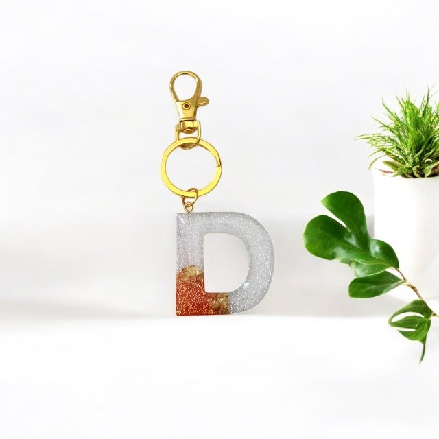 Scintillating Red and White Classic Resin Keychain with Silver glitter - Alphabet D