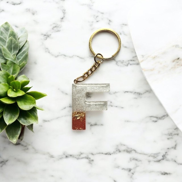 Scintillating Red and White Classic Resin Keychain with Silver glitter - Alphabet F