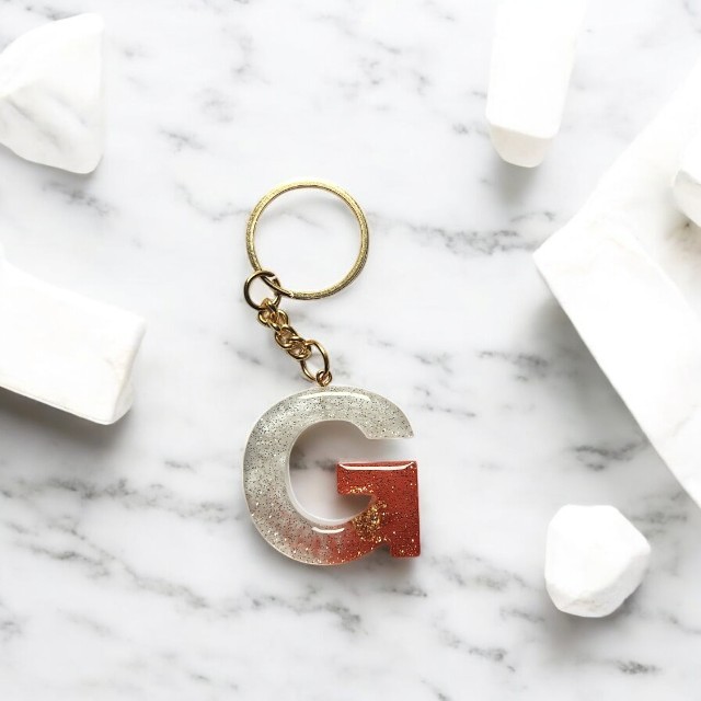 Scintillating Red and White Classic Resin Keychain with Silver glitter - Alphabet G